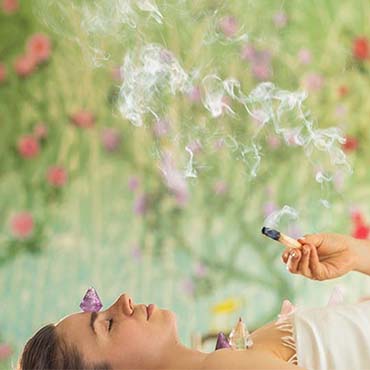 Pranic healing with palo santo session